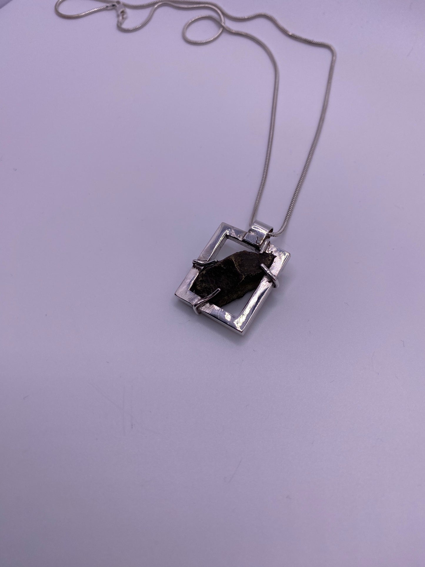 Silver Frame Rock Pendant